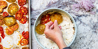 Layer tomatoes on the cheese