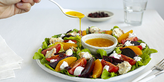 Drizzle dressing over salad